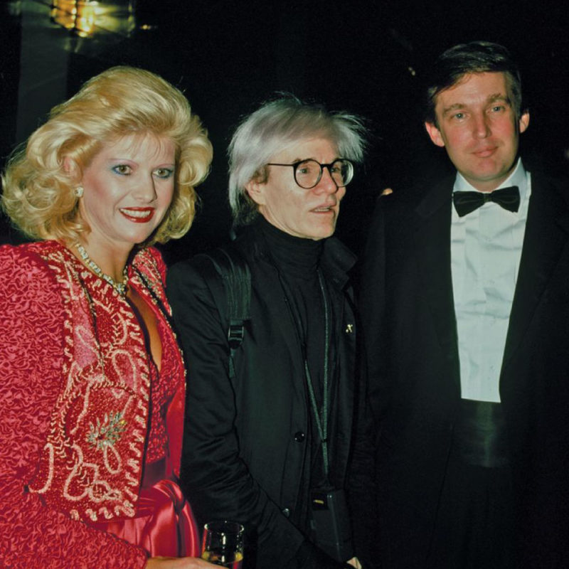 Andy Warhol is flanked on one side by Ivanka Trump and Donald Trump on the other.