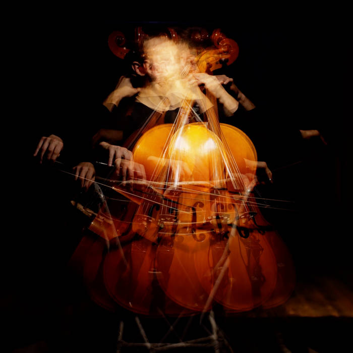 Abstract image of a cellist in motion, creating a layered effect with blurred hands and cello in a dark background.